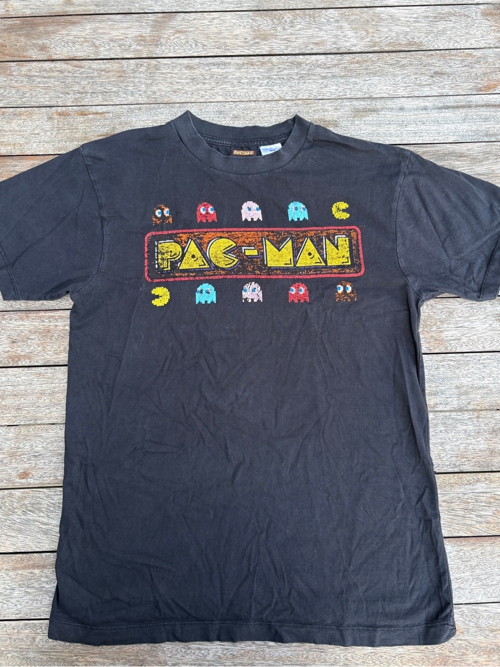 Vintage Pac-Man Black Graphic Tee with Retro Game Print